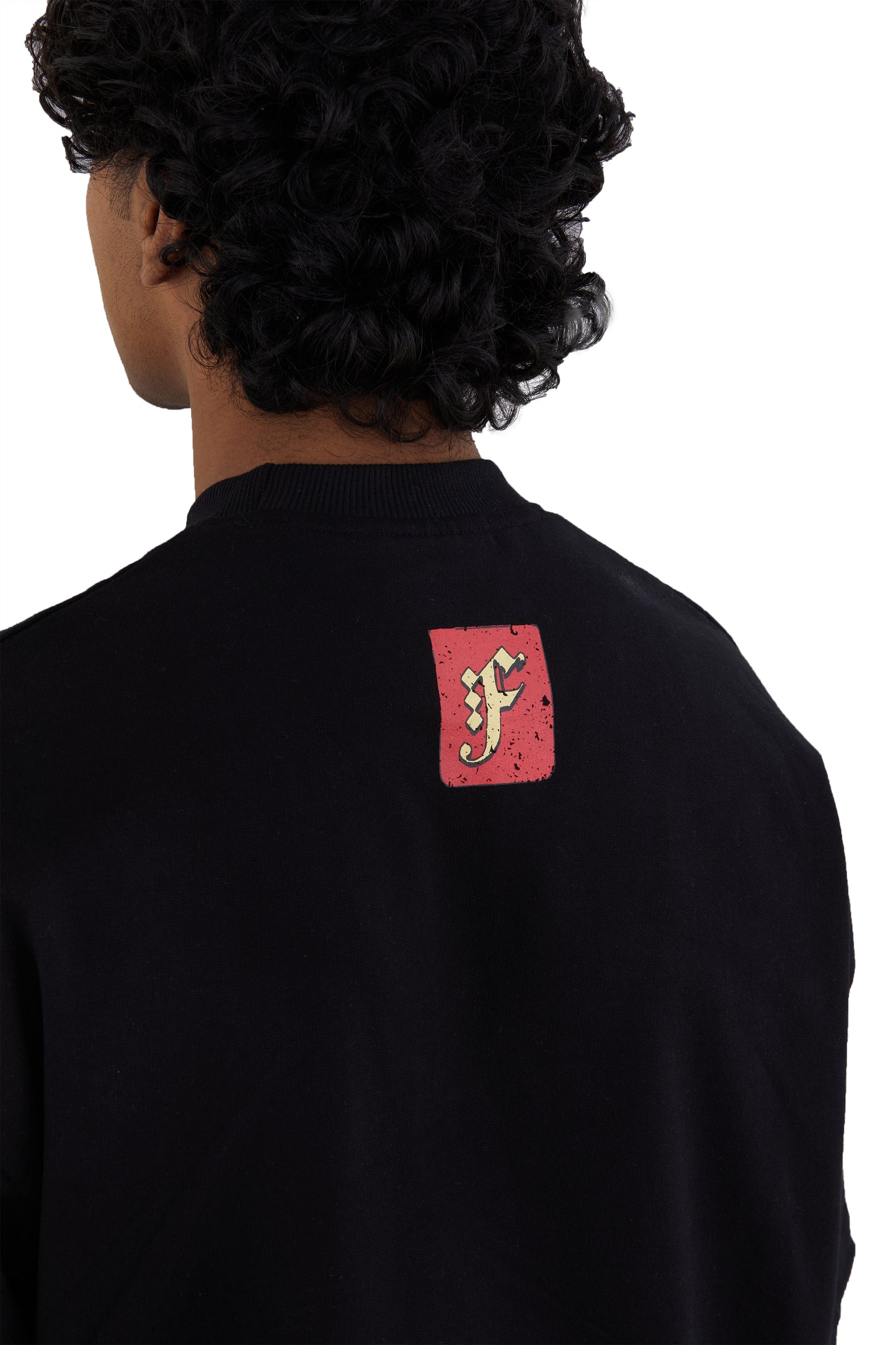 The Legacy Tee by Fekki is a striking black t-shirt featuring an emblem that embodies strength and identity. Crafted from 100% cotton, this tee offers a perfect balance of style and comfort, making it ideal for individuals who appreciate subtle yet impactful fashion. The Legacy Tee is designed for those who value limited-edition pieces that reflect a sense of belonging and pride. With its sleek silhouette and unique emblem, it seamlessly fits into any wardrobe. Enjoy free shipping across India