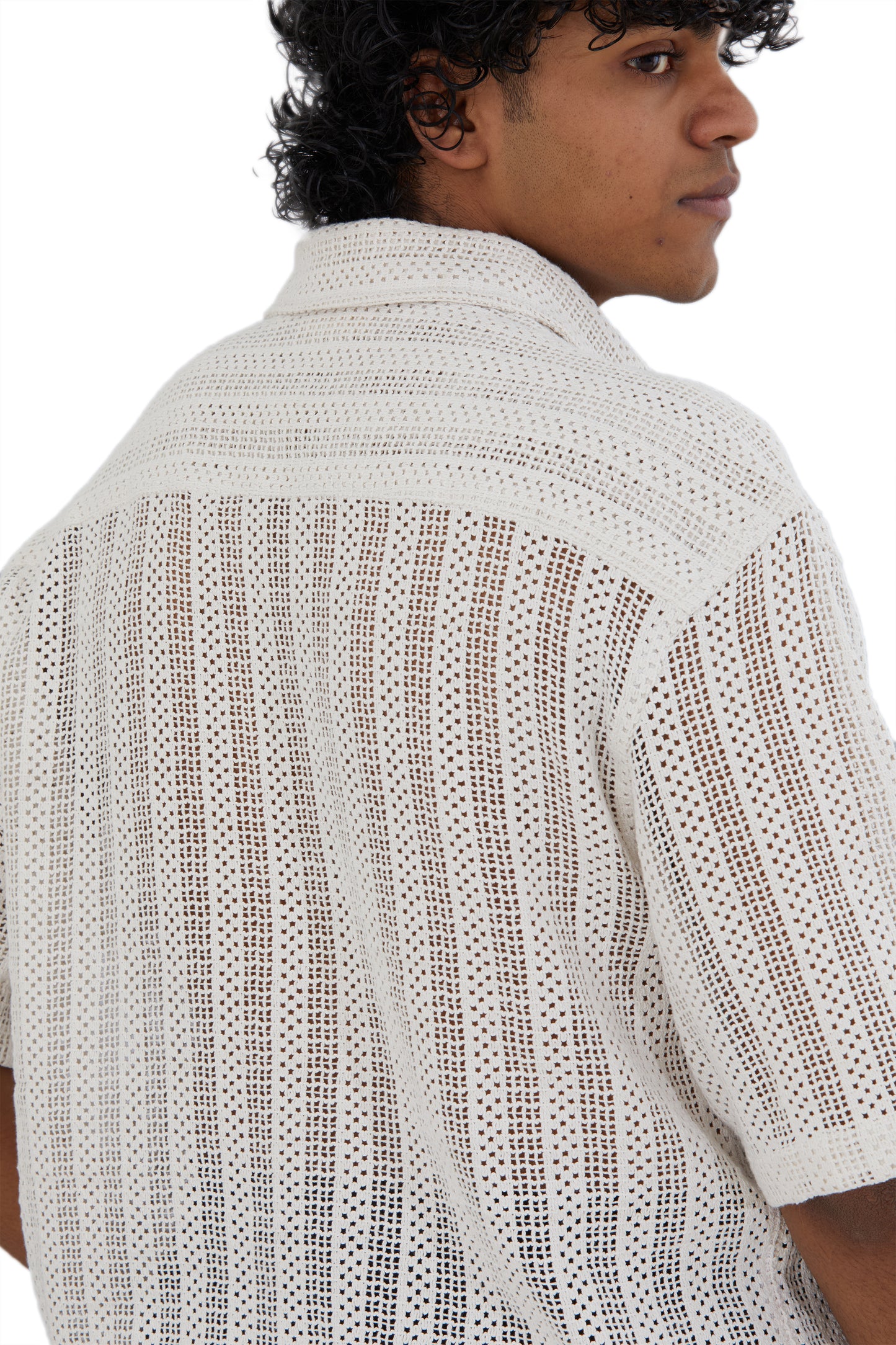 The Cream Crochet Shirt by Fekki combines timeless elegance with a contemporary edge. This versatile cream-colored (or white) crochet shirt offers a textured, handcrafted design that stands out in both casual and upscale settings. Made from 100% cotton, it’s lightweight, breathable, and machine washable, delivering both style and comfort. As a limited-edition piece, the Cream Crochet Shirt is ideal for fashion-conscious individuals looking for something unique and sophisticated. Enjoy free shipping across I