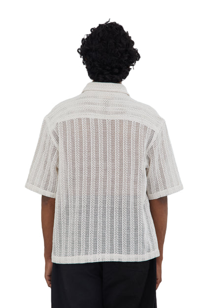 The Cream Crochet Shirt by Fekki combines timeless elegance with a contemporary edge. This versatile cream-colored (or white) crochet shirt offers a textured, handcrafted design that stands out in both casual and upscale settings. Made from 100% cotton, it’s lightweight, breathable, and machine washable, delivering both style and comfort. As a limited-edition piece, the Cream Crochet Shirt is ideal for fashion-conscious individuals looking for something unique and sophisticated. Enjoy free shipping across I